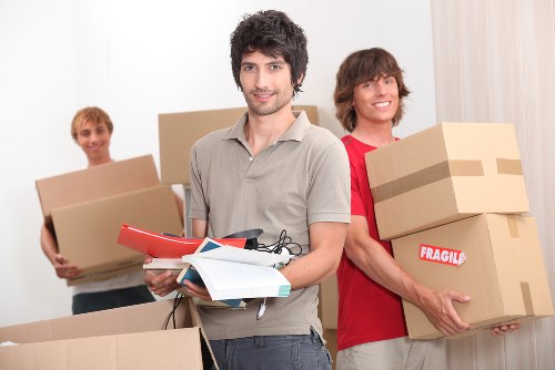 Team preparing boxes and furniture for transport