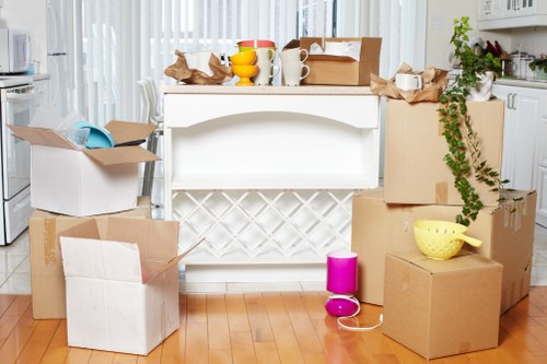 Removal crew loading commercial items for transport in London