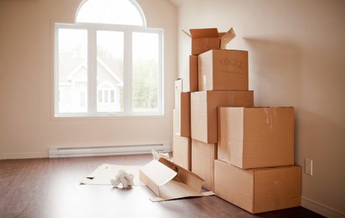 Moving boxes and furniture prepared for a house removal in London