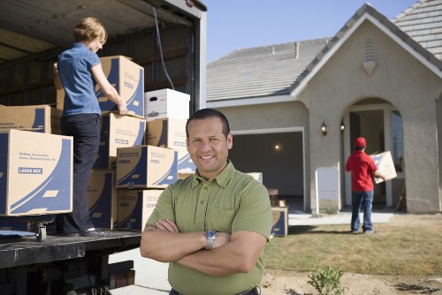 Packed household items and furniture ready for transport