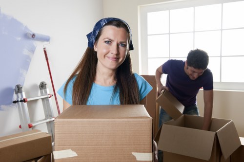 Prepared moving boxes and furniture ready for house removals