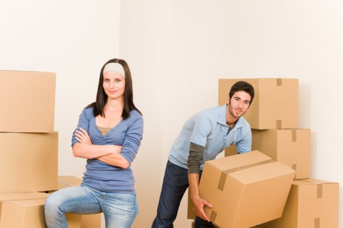 Furniture being moved from a London home with narrow access