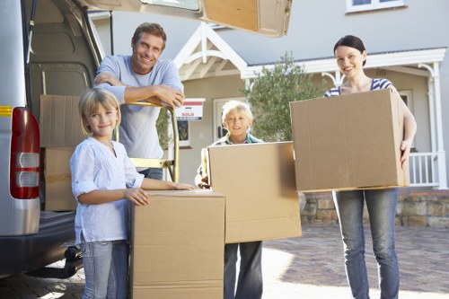 House removal team preparing furniture for a London home move