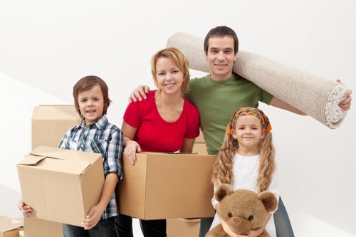Local movers handling furniture loading in London