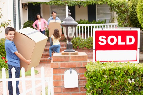 A family preparing belongings for a house removal in London