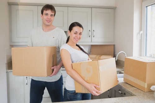 Professional movers handling a London home move with care